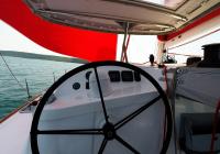trimaran multihull sailing yacht neel 45 skipper cockpit steering wheel instruments gibb
